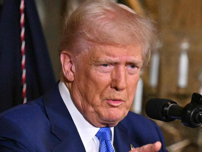 TOPSHOT - US President Donald Trump speaks during signing of executive orders at his Mar-a-Lago resort in Palm Beach, Florida, on February 18, 2025. (Photo by ROBERTO SCHMIDT / AFP)