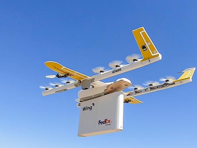 This handout image obtained September 19, 2019 courtesy of Wing Aviation LLC, shows a first-of-its-kind drone delivery service. - The drone unit spun out of a "moonshot" lab at Google parent Alphabet will start making "last-mile" deliveries for FedEx and Walgreens next month under a pilot project announced Thursday. The drone delivery service to launch in October in Christiansburg, Virginia, will be the most advanced real-world test of the technology to quickly fly items ranging from Gummy Bears to painkillers to customers, Wing chief executive James Burgess said September 19, 2019. (Photo by HO / Wing Aviation LLC / AFP) / RESTRICTED TO EDITORIAL USE - MANDATORY CREDIT "AFP PHOTO / WING AVIATION LLC/HANDOUT" - NO MARKETING - NO ADVERTISING CAMPAIGNS - DISTRIBUTED AS A SERVICE TO CLIENTS