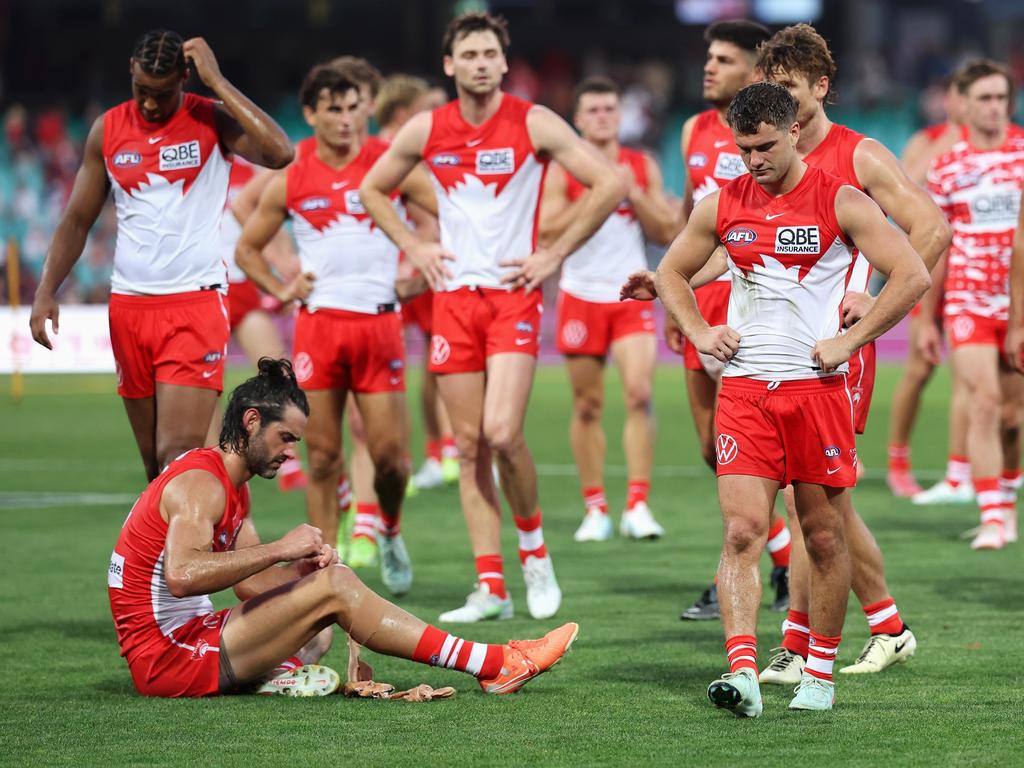 The Swans react after their loss to the Lions. (Photo by Cameron Spencer/Getty Images)