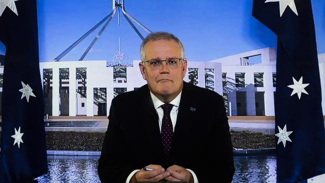 Scott Morrison take part in question time from quarantine in Canberra on Monday. Picture: Martin Ollman