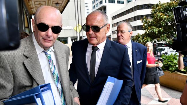 Chris Dawson (centre) arriving at the Downing Centre court in Sydney today. Picture: AAP