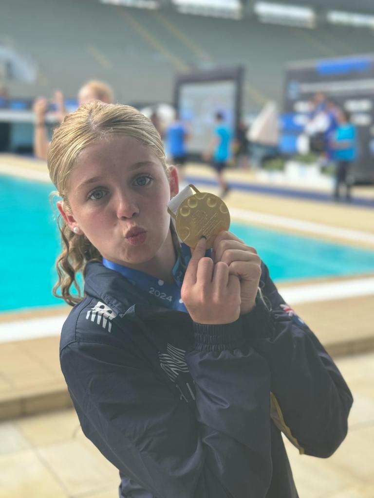 Maggie Grey with her world junior gold medal.