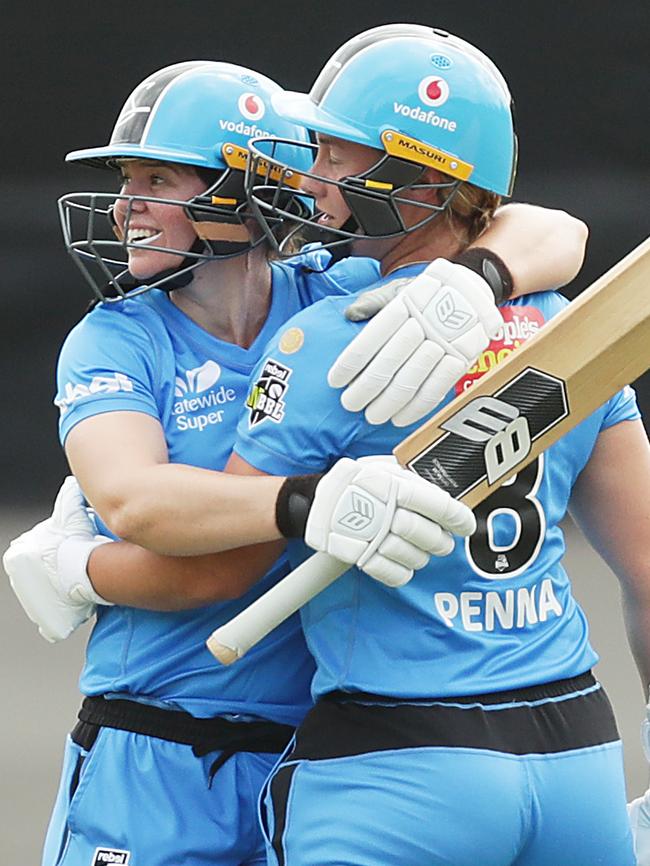 Madeline Penna is embraced by Tegan McPharlin after her late heroics.