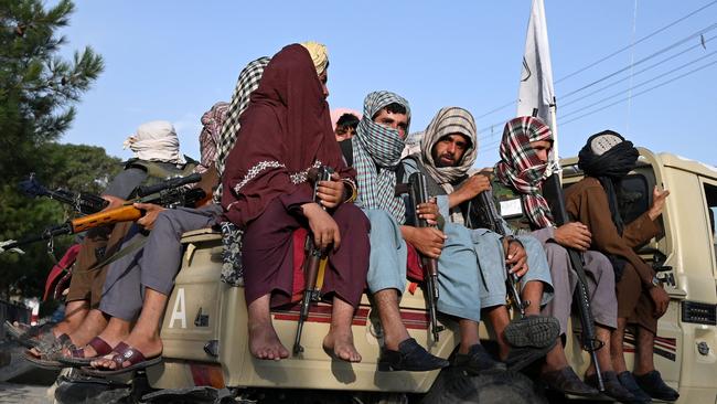 Taliban fighters in a vehicle patrol the streets of Kabul. Picture: AFP