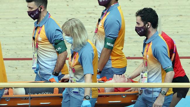 Isle of Man's Matthew Bostock is carried on a stretcher