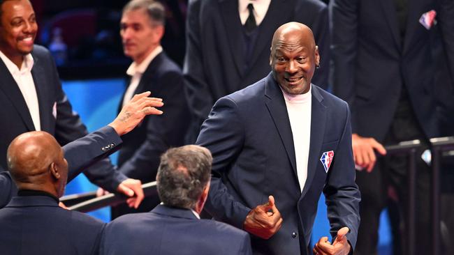 Michael Jordan reacts after being introduced as part of the NBA 75th Anniversary Team during the 2022 NBA All-Star Game Jason Miller/Getty Images