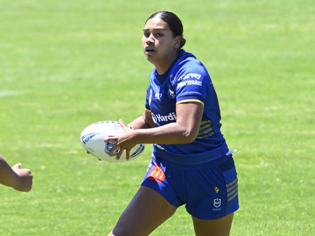 Khyliah Gray takes on the Raiders’ line. Picture: Martin Ollman