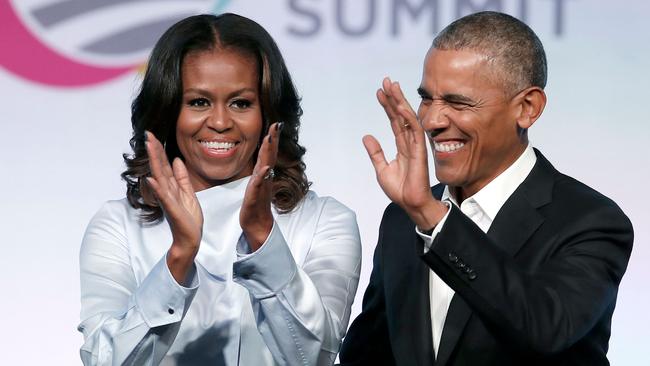 The Obamas scored a staggering $A82.9 million book deal. Picture: Jim Young/AFP