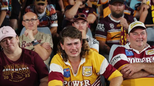 DAILY TELEGRAPH OCTOBER 1, 2023NRL Telstra Premiership Grand Final at Accor Stadium between Penrith Panthers and Brisbane Broncos. Penrith wins 26-24 with a late try by Nathan Cleary. A dejected Brisbane fan sheds a few tears. Picture: David Swift