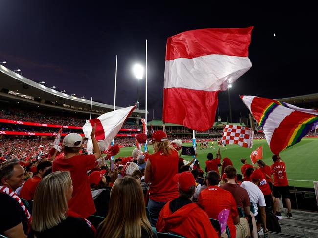 Swans fans cheer during Opening Round against Hawthorn. Picture: Michael Willson/AFL Photos via Getty Images.