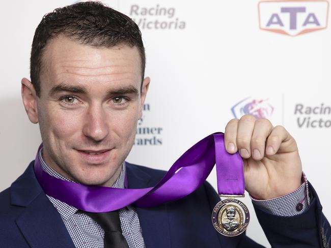 Martin Kelly with the Tommy Corrigan Medal he won during the 2018 Victorian Jockey and Trainer Awards in happier times. Picture: Daniel Pockett