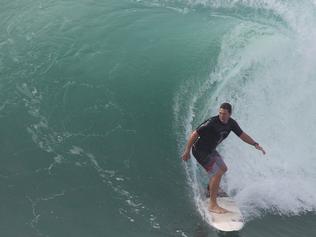 In pictures: Surfers enjoy massive swell