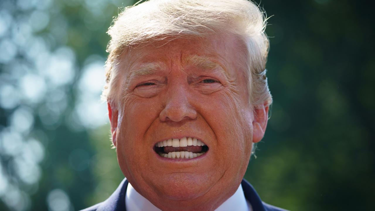 US President Donald Trump speaks to the press as he departs the White House in Washington. Picture: Mandel Ngan