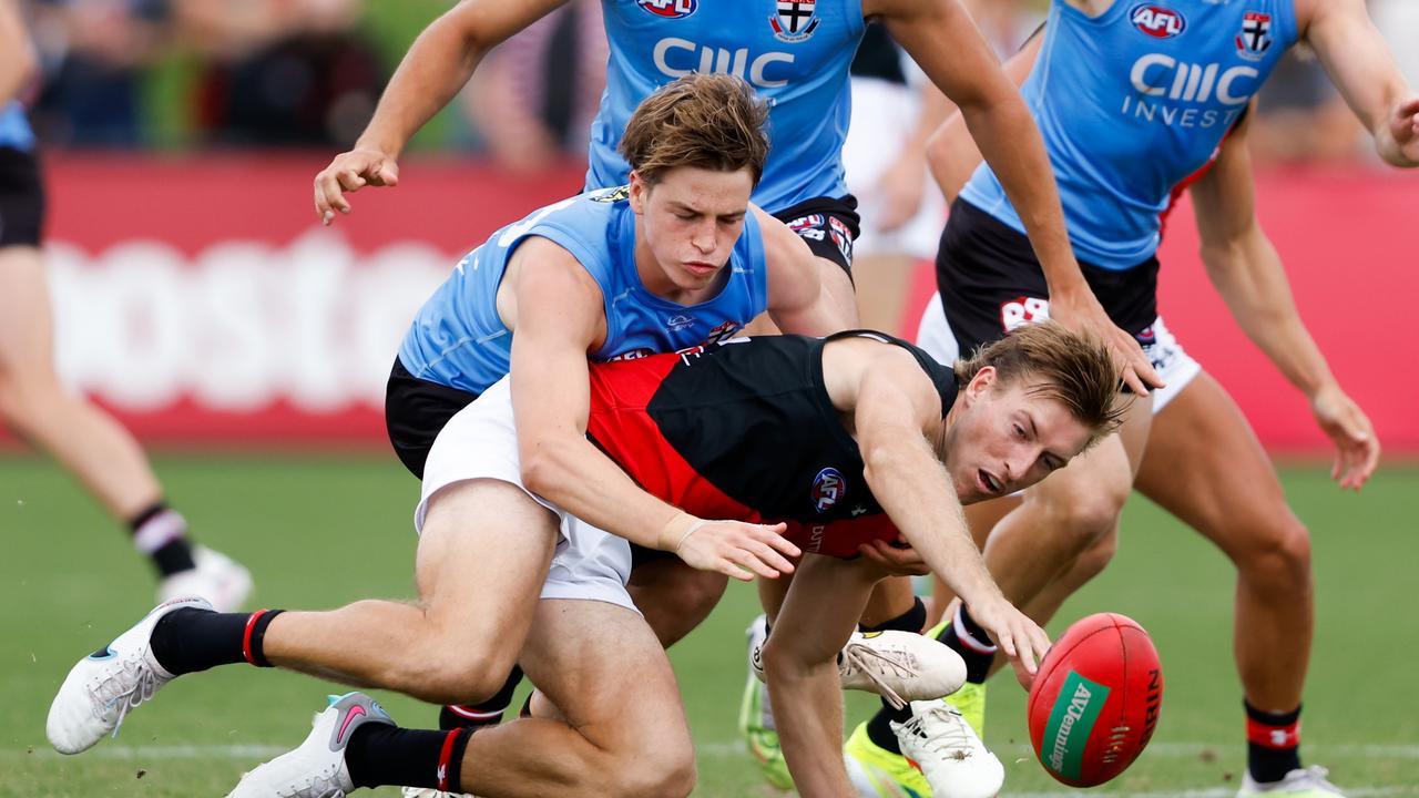 Will Setterfield and Mattaes Phillipou compete in the centre square on a sorry day for the Dons at RSEA Park. Picture: Dylan Burns/AFL Photos via Getty Images.