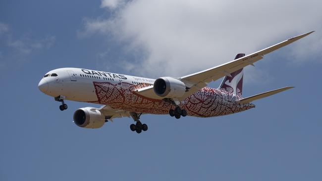 A Qantas repatriation flight touches down at RAAF Base Darwin on October 23, 2020. Picture: Lisa McTiernan/Getty Images