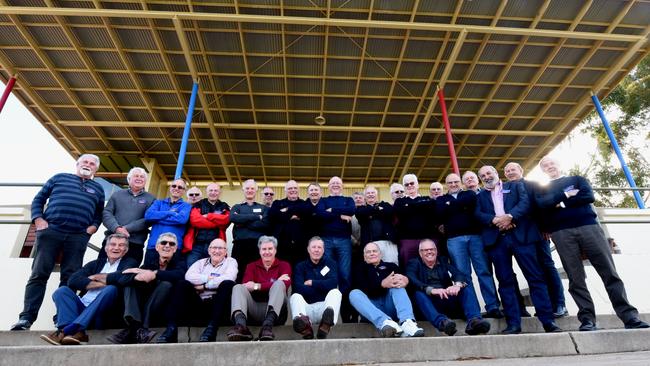 Players from Berri's premiership teams of the late 1960s gather in front of the old grandstand at Berri Memorial Oval. Picture: BERNARD HUMPHREYS