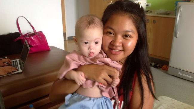 Thai surrogate mother Pattaramon Chanbua poses with baby Gammy at the Samitivej Hospital in 2014.