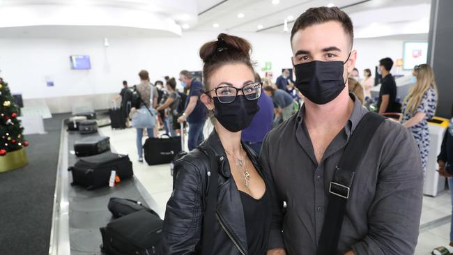 Teagan Lowe and Darcy Andrews at Melbourne Airport. Picture: David Crosling