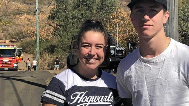 HISTORY REPEATS: Caleb and Deanna Brown relive the 2015 fires  when they had to evacuate their Lakes Creek home. Picture: Jann Houley