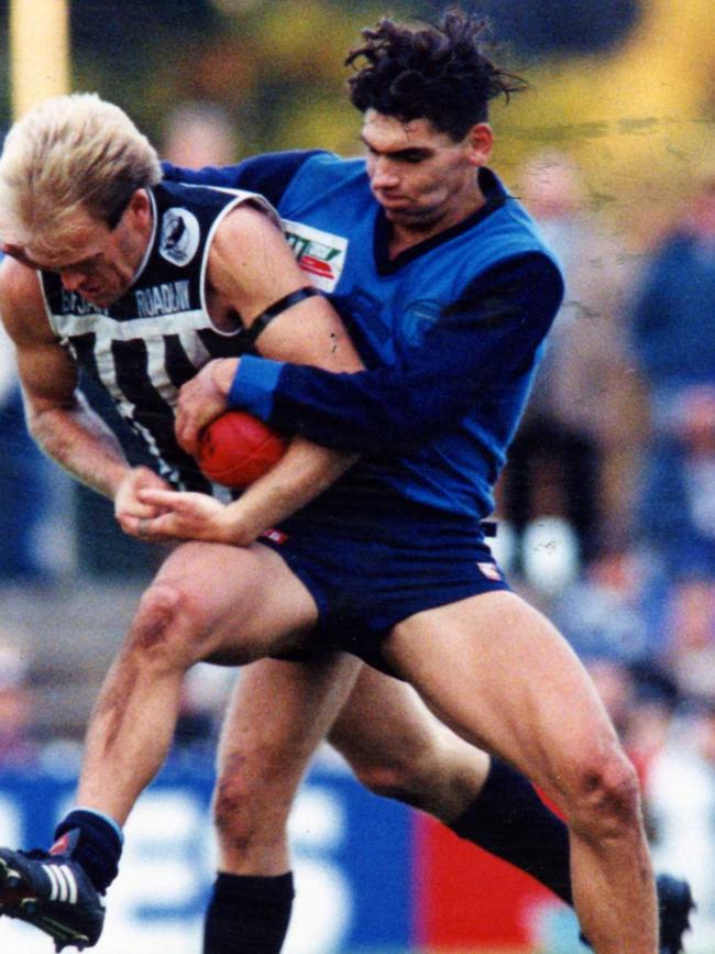 Sturt’s Corey Gray tackles Magpie Darren Smith in 1993. Picture: Ray Titus