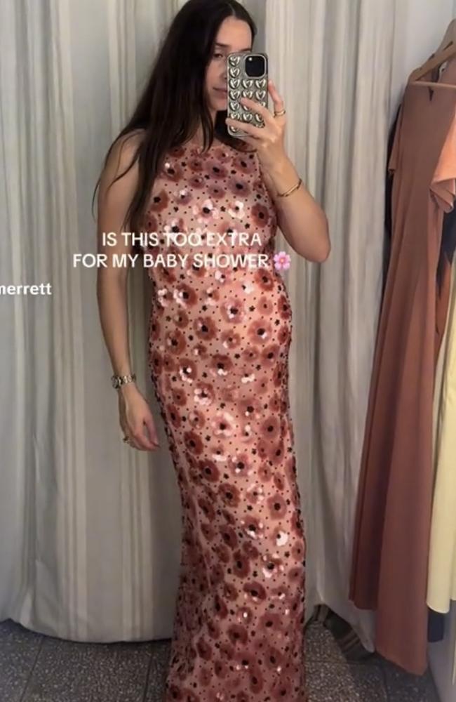 The wife of Essendon skipper Zach Merrett shows of a possible outfit for her baby shower. Picture: TikTok