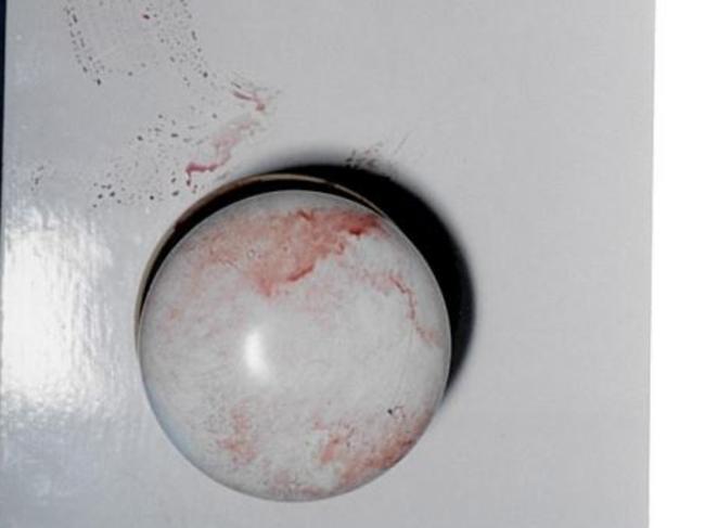 Blood on a bedroom door handle.