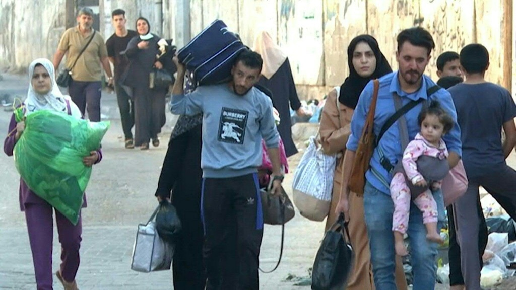 Thousands Flee North Gaza After Israel Evacuation Warning | The Australian