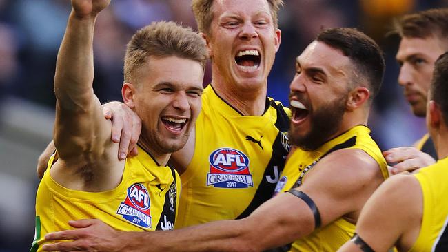 Dan Butler (left) celebrates a goal during the Grand Final. Picture: Michael Klein