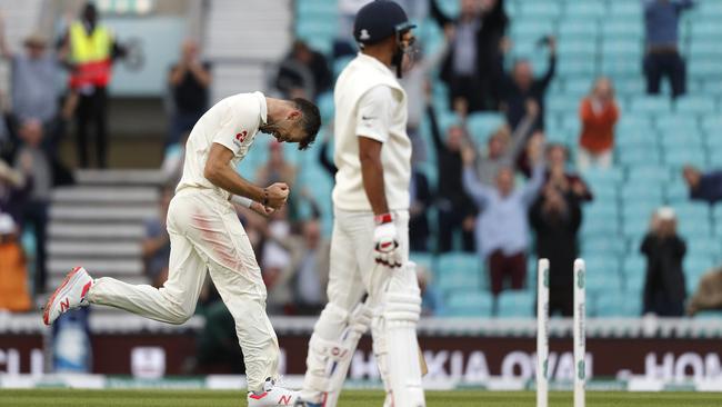 Jimmy Anderson got the record in trademark style. Picture: AFP.