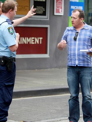 Fawcett with police after the altercation.