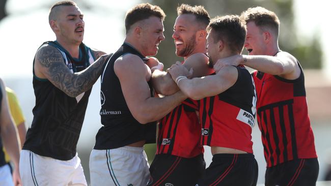 Laurimar and Panton Hill players come together for a chat. Picture: David Crosling