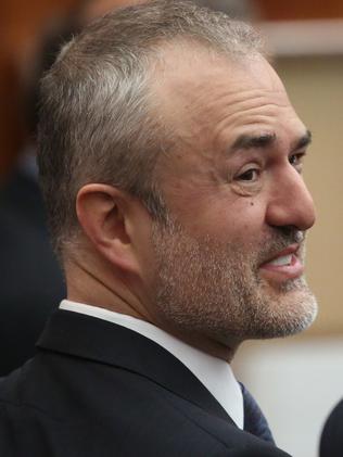 Nick Denton, founder of Gawker, talks with his legal team before Terry Bollea, aka Hulk Hogan, testifies in court. Picture: Getty