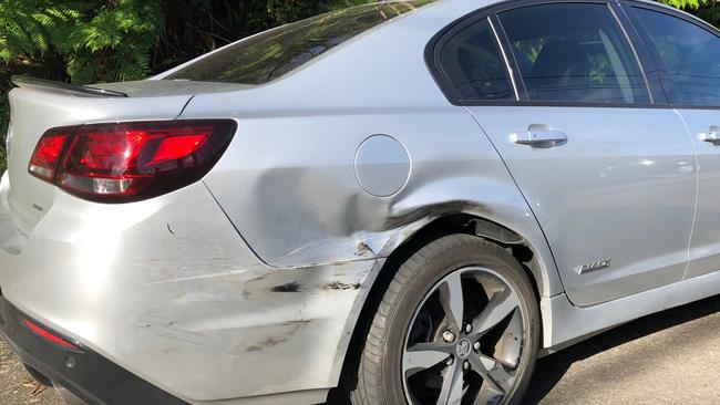 A Holden Commodore damaged in an accident on Macquarie St, Cromer, caused by a drink driving mother with her five-year-old daughter in the back seat. Picture: Abby O’Rourke.