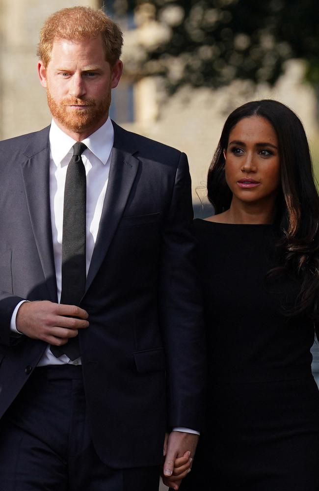 Meghan and Harry are out in the cold but could be invited back into the royal fold. Picture: Kirsty O'Connor / POOL / AFP