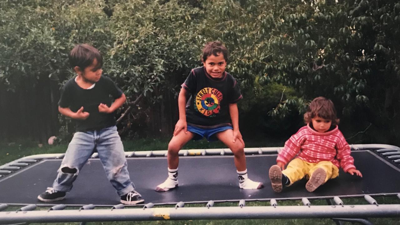 Jillibalu Riley (centre) being a daredevil on the trampoline as a kid. Picture: supplied