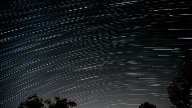 An 88-image composite of the Geminid meteor shower above Brisbane last year. Picture: Paul Balfe