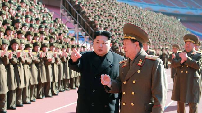 (FILES) This undated file picture released from North Korea's official Korean Central News Agency (KCNA) on February 2, 2015 shows North Korean leader Kim Jong-Un (centre L) speaking with Hwang Pyong-So (centre R) as he meets with the participants in a meeting of military and political cadres at an undisclosed location in North Korea. North Korea's apparent punishment of its top two military officials, including Hwang Pyong-So, is aimed at tightening leader Kim Jong-Un's one-man rule over all sectors of the regime, analysts said on November 21, 2017. / AFP PHOTO / KCNA VIA KNS / - / South Korea OUT / REPUBLIC OF KOREA OUT   ---EDITORS NOTE--- RESTRICTED TO EDITORIAL USE - MANDATORY CREDIT "AFP PHOTO/KCNA VIA KNS" - NO MARKETING NO ADVERTISING CAMPAIGNS - DISTRIBUTED AS A SERVICE TO CLIENTS THIS PICTURE WAS MADE AVAILABLE BY A THIRD PARTY. AFP CAN NOT INDEPENDENTLY VERIFY THE AUTHENTICITY, LOCATION, DATE AND CONTENT OF THIS IMAGE. THIS PHOTO IS DISTRIBUTED EXACTLY AS RECEIVED BY AFP.  /