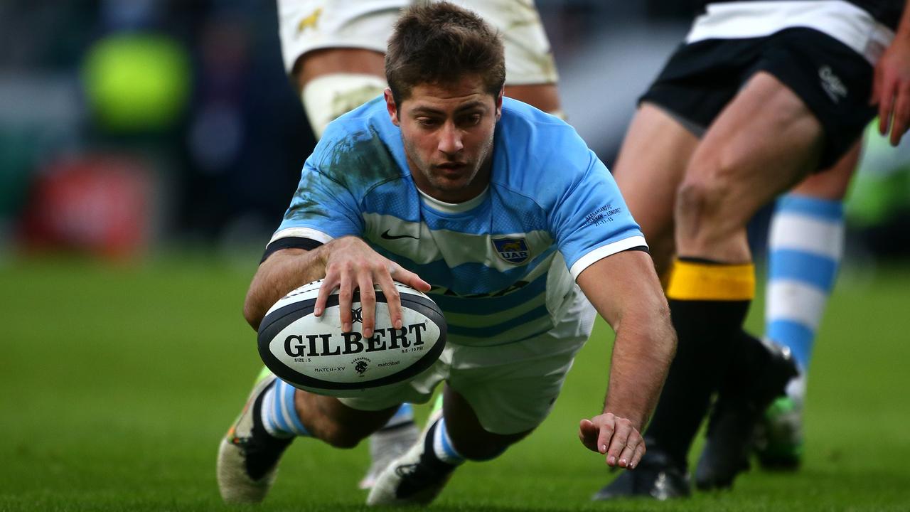 Santiago Cordero of Argentina scores a try at Twickenham.