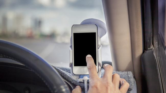 Fully licenced drivers in NSW can use their phone in a cradle for limited purposes.