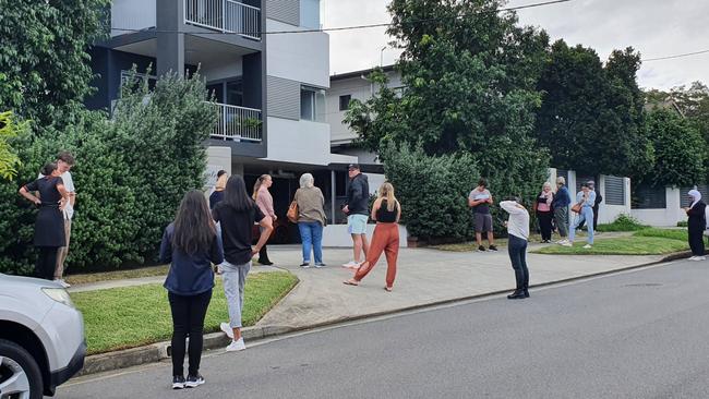 Renters line up to inspect a unit for rent in Kedron. Image: Debra Bela.