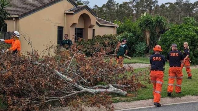 SES workers clearing properties on the Gold Coast after the Christmas Eve storm event.