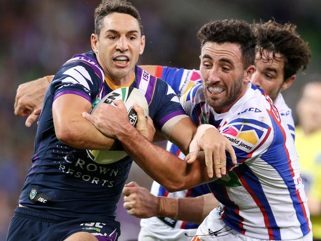 Billy Slater tries to charge through the Knights. Pic: Michael Klein