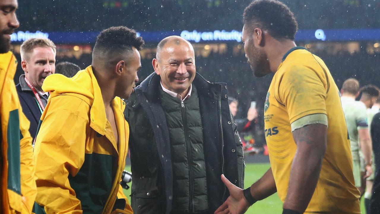 Eddie Jones with Will Genia and Samu Kerevi.