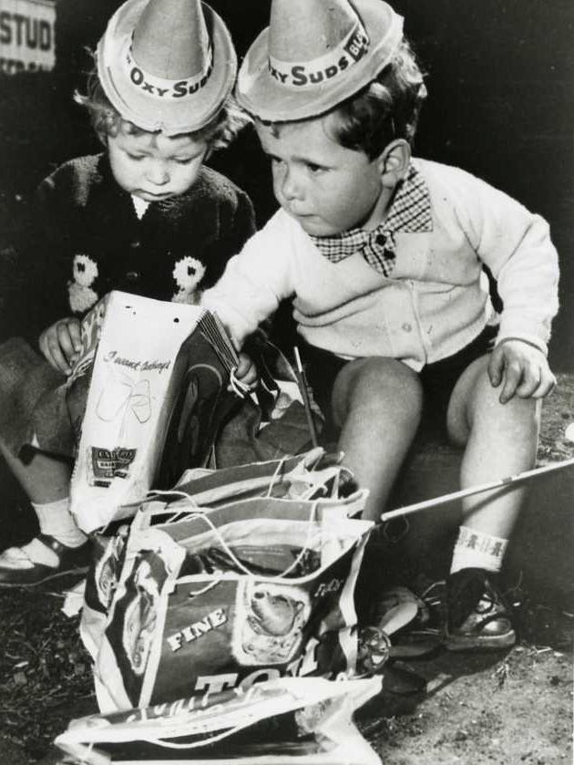 Date unknown — Children enjoy their showbags.