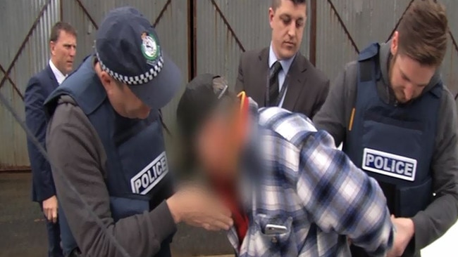 Coomera man John Charles White, 74, being arrested at Deniliquin in September 2015. Photo: Supplied.