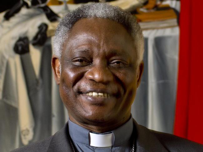 ADD FEB. 12 - Ghanian Cardinal Peter Kodwo Appiah Turkson poses for a photograph following an interview with the Associated Press, in Rome, Tuesday, Feb. 12, 2013. One of Africa's brightest hopes to be the next pope, Ghanian Cardinal Turkson, says the time is right for a pontiff from the developing world. (AP Photo/Domenico Stinellis)