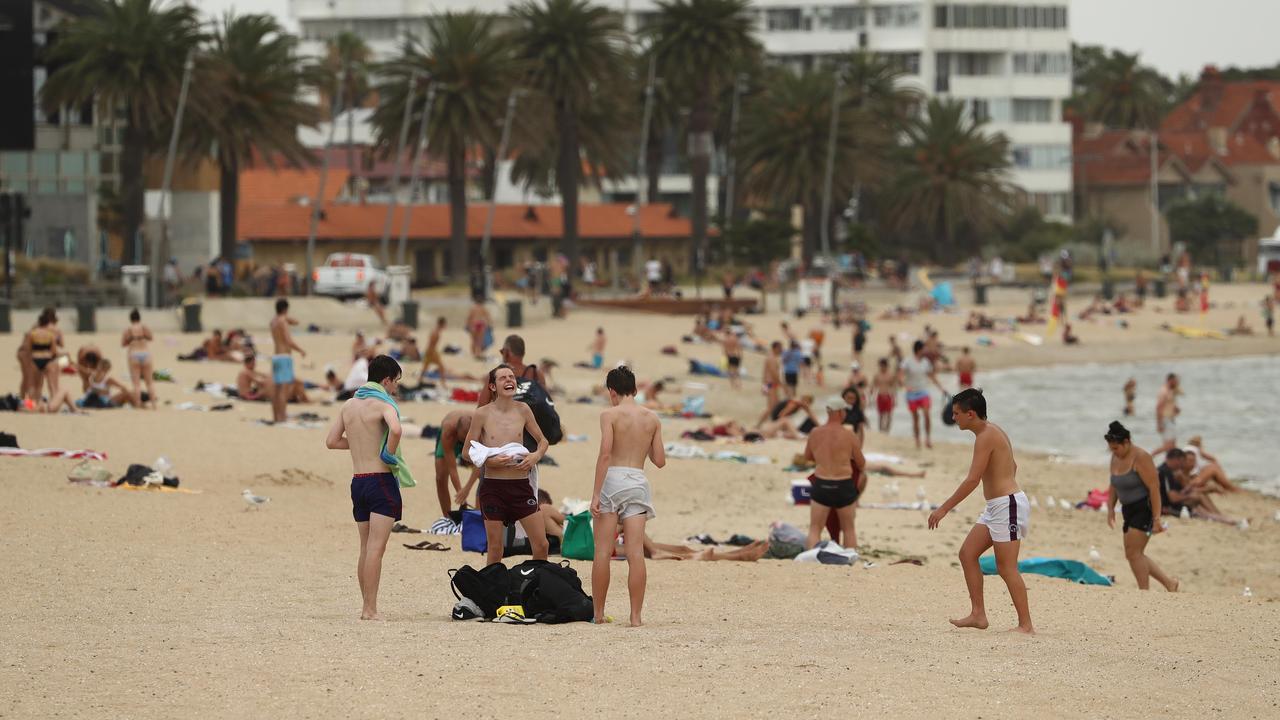 People cooling off at Port Melbourne Beach. Picture: Robert Cianflone/Getty Images