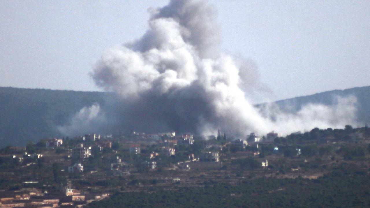 Smoke rises above a southern Lebanese village, Tyre, after an Israeli strike. Attacks are less unusual in the country’s south. Picture: Kawnat Haju/AFP