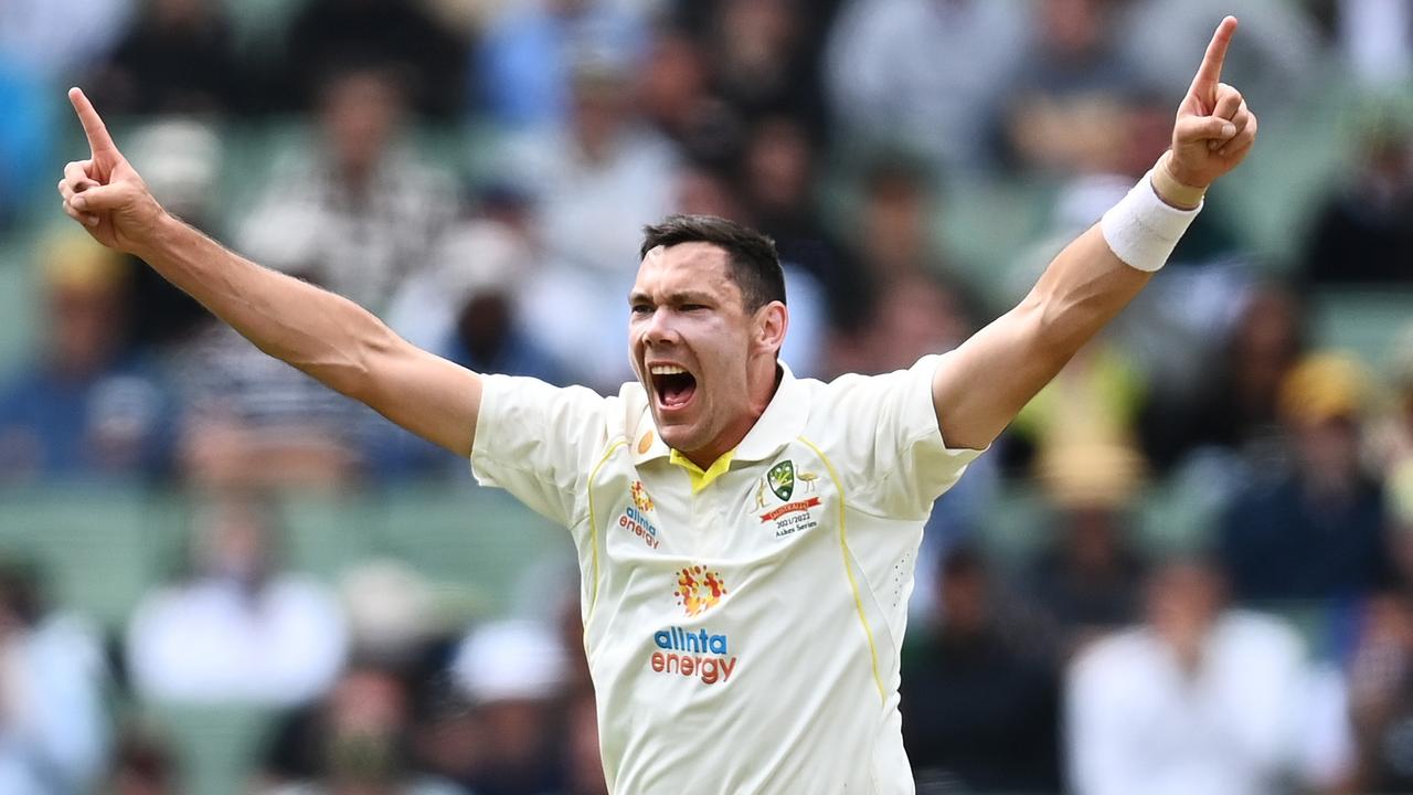 Former St Bede’s student Scott Boland of Australia celebrates after taking his first test wicket dismissing Mark Wood of England. Photo: Getty Images