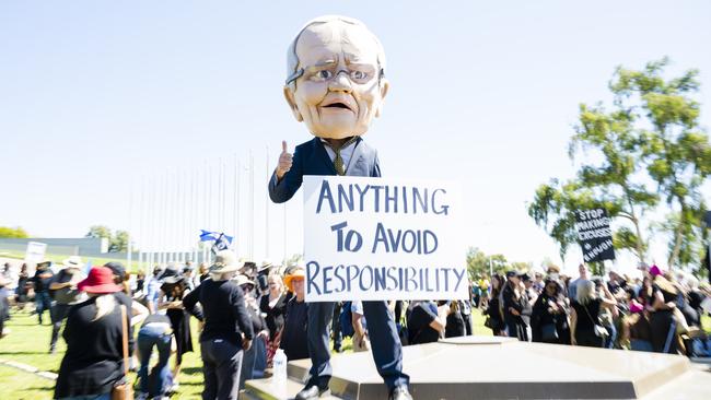 Protesters attend the Womens March 4 Justice Rally on March 15 in Canberra.